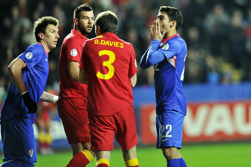 Swansea (Wales), 260313.
Stadion Liberty.
Kvalifikacijska utakmica za Svjetsko prvenstvo u Brazilu 2014. godine, izmedju reprezentacija Walesa i Hrvatske.
Na fotografiji: Eduardo Da Silva nakon promasenog udarca prema golu.
Foto: Boris Kovacev / CROPIX Swansea (Wales), 260313.
Stadion Liberty.
Kvalifikacijska utakmica za Svjetsko prvenstvo u Brazilu 2014. godine, izmedju reprezentacija Walesa i Hrvatske.
Na fotografiji: Eduardo Da Silva nakon promasenog udarca prema golu.
Foto: Boris Kovacev / CROPIX