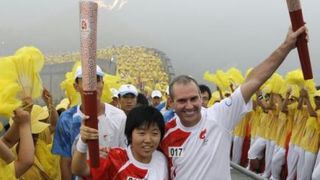 Olimpijska baklja na kineskom zidu