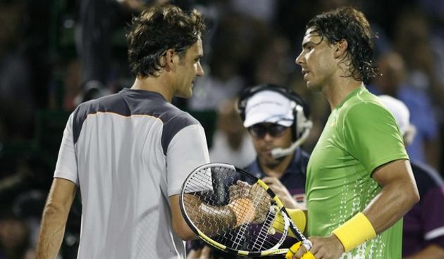 Roger Federer of Switzerland (L) congratulates Rafael Nadal of Spain // Reuters