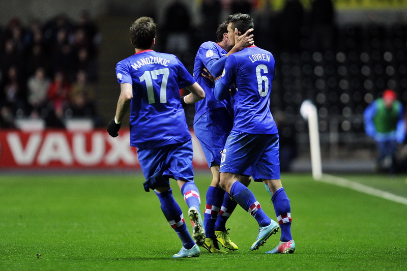 Swansea (Wales), 260313.
Stadion Liberty.
Kvalifikacijska utakmica za Svjetsko prvenstvo u Brazilu 2014. godine, izmedju reprezentacija Walesa i Hrvatske.
Na fotografiji: slavlje nakon pogotka Hrvatske.
Foto: Boris Kovacev / CROPIX Swansea (Wales), 260313.
Stadion Liberty.
Kvalifikacijska utakmica za Svjetsko prvenstvo u Brazilu 2014. godine, izmedju reprezentacija Walesa i Hrvatske.
Na fotografiji: slavlje nakon pogotka Hrvatske.
Foto: Boris Kovacev / CROPIX