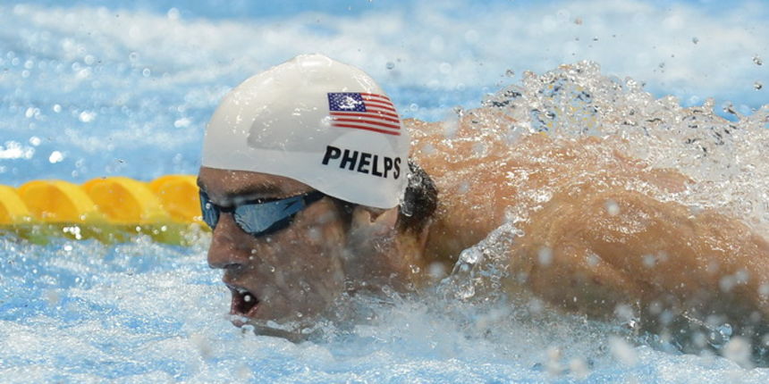 London, 020812.
Aquatics Centar.
Americki plivac Michael Phelps rekorder po osvojenim zlatnim medaljama u Pekingu te osvojenih najvise medalja na Olimpijskim Igrama tokom kvalifikacijske utrke 200 metara leptir tokom Olimpijskih Igra u Londonu.
Foto: Drag