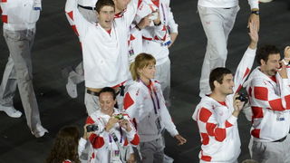 London, 270712.
Olimpijski stadion.
Svecano otvaranje Olimpijskih Igra u Londonu.
Na fotografiji: hrvatski sportasi u defileu, rukometni golman Venio Losert nosi zastavu.
Foto: Drago Sopta / CROPIX