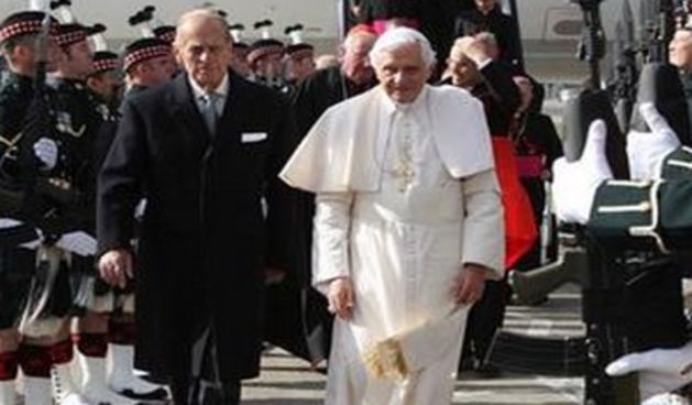 Pope Benedict XVI, centre right, is met by the Duke of Edinburgh as he arrives in Scotland to begin the first papal state visit to the UK., Thursday Sept. 16, 2010. (AP Photo /  Andrew Milligan, Pool)