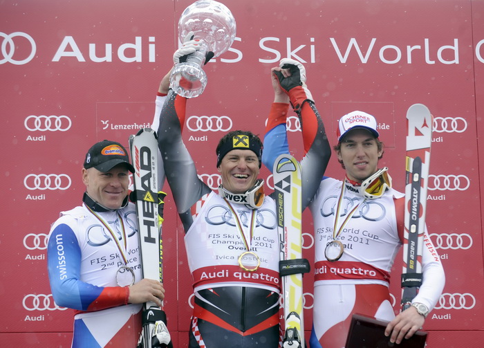 Lenzerheide, 190311.
Zavrsnica Svjetskog skijaskog kupa u skijanju u svicarskom mjestu Lenzerheide, Ivica Kostelic kao najbolji skijas u ukupnom poretku osvajac velikog kristalnog globusa. 
Na slici: pored Didier Cuche i Carlo Janka.
Foto: Drago Sopta / C