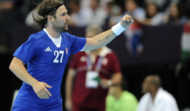 London, 020812.
Dvorana Copper Box.
Hrvatska muska rukometna reprezentacija igra utakmicu 3. kolo u skupini B protiv Madjarske tokom Olimpijskih Igra u Londonu.
Na fotografiji: Ivan Cupic slavi nakon gola.
Foto: Drago Sopta / CROPIX