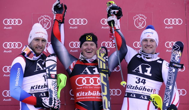 Kitzbuhel, 230111. Fis Audi World Cup u Kitzbuhelu, Svjetski skijaski kup u Kitzbuhelu, postolje pobjednika nakon slalomske utrke i kombinacije. Na slici: pobjednik kombinacije Ivica Kostelic, drugi svicarac Zurbriggen i treci austrijanac Baumann. Foto: D