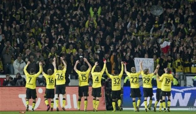 Players of Borussia Dortmund celebrate after the German first division Bundesliga soccer match  // AP Photo