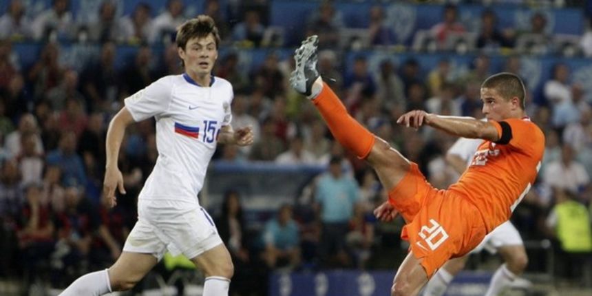 Dinijar Biljaletdinov i Affelay (Foto: Reuters@dylife.com) Dinijar Biljaletdinov i Affelay (Foto: Reuters@dylife.com)