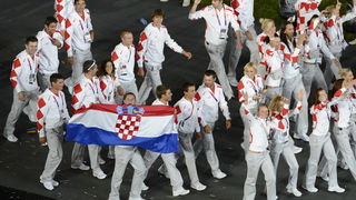 London, 270712.
Olimpijski stadion.
Svecano otvaranje Olimpijskih Igra u Londonu.
Na fotografiji: hrvatski sportasi u defileu, rukometni golman Venio Losert nosi zastavu.
Foto: Drago Sopta / CROPIX