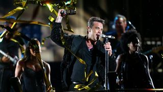 13.08.2013., Zagreb – Britanski pjevac Robbie Williams odrzao je koncert na maksimirskom stadionu u sklopu turneje Take the crown. Photo: Petar Glebov/Pixsell 13.08.2013., Zagreb – Britanski pjevac Robbie Williams odrzao je koncert na maksimirskom stadionu u sklopu turneje Take the crown. Photo: Petar Glebov/Pixsell