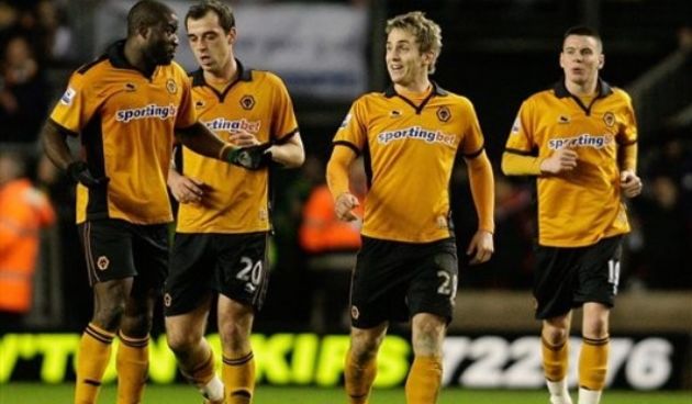 Wolverhampton Wanderers’ Kevin Doyle, second right, celebrates scoring // AP Photo