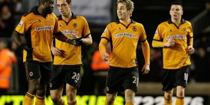 Wolverhampton Wanderers’ Kevin Doyle, second right, celebrates scoring // AP Photo
