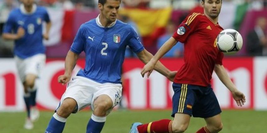 Christian Maggio i Andres Iniesta, foto: Reuters