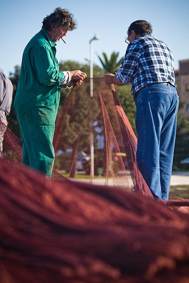 Ribar krpa mrižu svoju (foto:Saša Čuka) Ribar krpa mrižu svoju (foto:Saša Čuka)