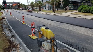 Asfaltiranje kolnika rekonstruiranog i proširenog križanja kod Veslačkog Asfaltiranje kolnika rekonstruiranog i proširenog križanja kod Veslačkog