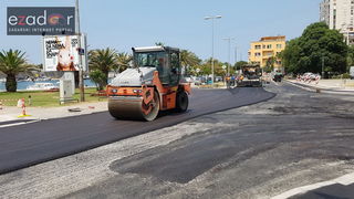 Asfaltiranje kolnika rekonstruiranog i proširenog križanja kod Veslačkog Asfaltiranje kolnika rekonstruiranog i proširenog križanja kod Veslačkog