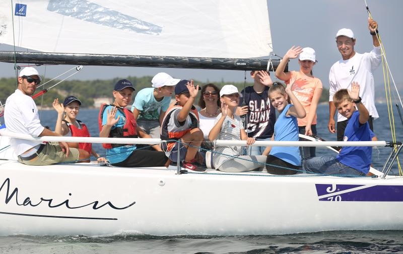 Zlatni olimpijci Fantela i Marenić družili se sa šibenskom djecom povodom dana jedrenja. Photo: Duško Jaramaz/PIXSELL Zlatni olimpijci Fantela i Marenić družili se sa šibenskom djecom povodom dana jedrenja. Photo: Duško Jaramaz/PIXSELL