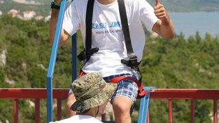 28.6.2014., Maslenica – Gimnasticar Marijo Moznik otvorio je sezonu bungee skokova s Maslenickog mosta. On je izveo dvostruki salto s uronom u more. Photo: Dino Stanin/PIXSELL