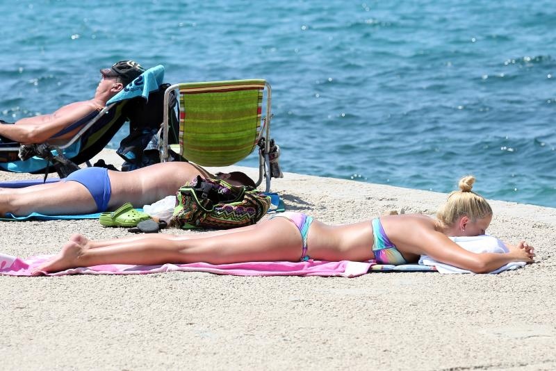 Uživanje u ljetu na vodičkim plažama. Photo: Duško Jaramaz/PIXSELL Uživanje u ljetu na vodičkim plažama. Photo: Duško Jaramaz/PIXSELL