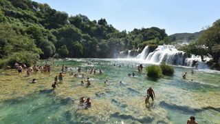 Rješenje za osvježenje: Kupanje u ledenoj rijeci Krki u NP Krka. Photo: Hrvoje Jelavić/PIXSELL