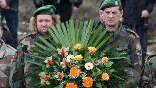 Polaganjem vijenaca na središnjem križu, u Novigradu je obilježena obljetnica pogibije članova HRM-a i Druge gardijske brigade za vrijeme akcije Maslenica. Photo: Dino Stanin/PIXSELL Polaganjem vijenaca na središnjem križu, u Novigradu je obilježena obljetnica pogibije članova HRM-a i Druge gardijske brigade za vrijeme akcije Maslenica. Photo: Dino Stanin/PIXSELL