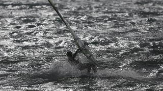 Zadar: Surferi uživaju u valovima koje je prouzročilo snažno jugo, Photo: Filip Brala/PIXSELL