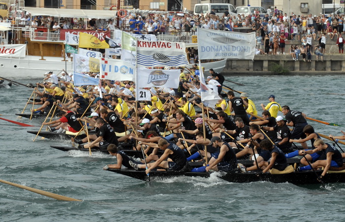 Metkovic, 140810.
Trinaesti maraton ladja vozi se od Metkovica do Ploca u duzini od 22,5 kilometara. U maratonu je nastupilo oko 600 veslaca u 35 ladjarskih posada.
Foto: Denis Jerkovic / Cropix