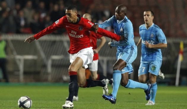 Guillaume Hoarau of Paris St Germain runs past Olympique Marseille Charles Kabore // Reuters