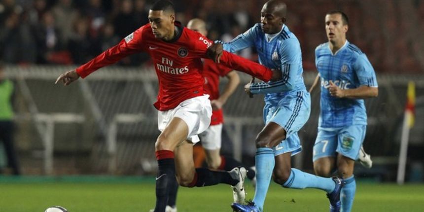 Guillaume Hoarau of Paris St Germain runs past Olympique Marseille Charles Kabore // Reuters Guillaume Hoarau of Paris St Germain runs past Olympique Marseille Charles Kabore // Reuters