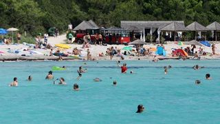 Ljetni dana na dugootočkoj plaži Sakarun, biseru Mediterana s prekrasnim tirkiznim morem, Foto: Filip Brala/PIXSELL Ljetni dana na dugootočkoj plaži Sakarun, biseru Mediterana s prekrasnim tirkiznim morem, Foto: Filip Brala/PIXSELL