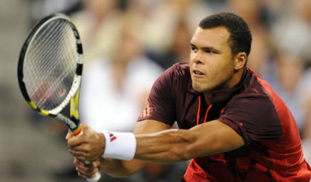 Jo-Wilfried Tsonga (FRA)[11] plays against Roger Federer (SUI)[3] during a men’s singles quarterfinals match on Day 11 of the US Open.