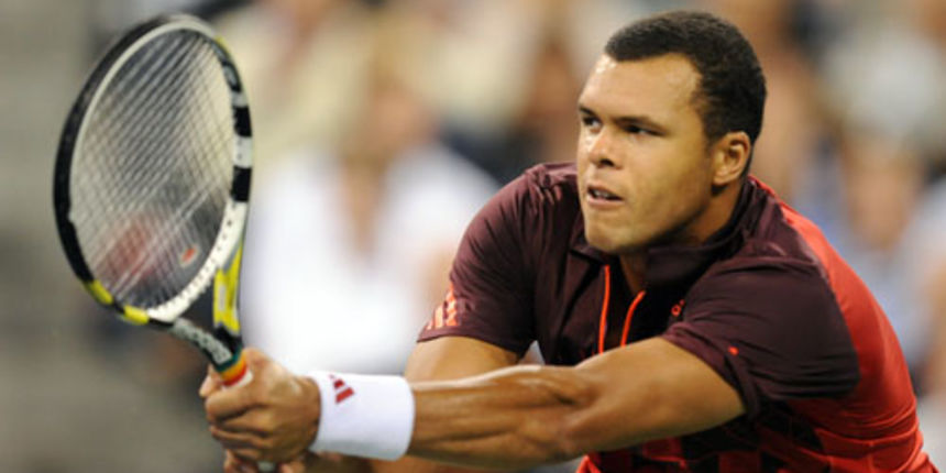 Jo-Wilfried Tsonga (FRA)[11] plays against Roger Federer (SUI)[3] during a men’s singles quarterfinals match on Day 11 of the US Open.
