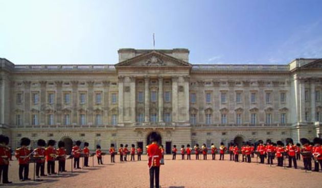 Band performing during The Changing of the Guard ceremony taking place in the courtyard of Buckingham Palace