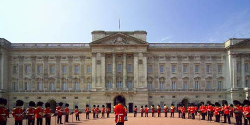 Band performing during The Changing of the Guard ceremony taking place in the courtyard of Buckingham Palace