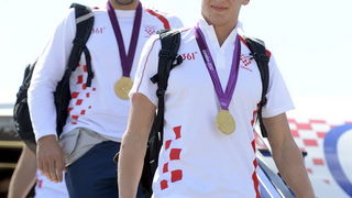 Zagreb, 130812.
Zracna luka Pleso.
Povratak Hrvatskih sportasa u Zagreb sa Olimpijskih igara u Londonu.
Na slici: Na povratku iz Londona sa Olimpijskih Igara, vecina hrvatskih sportasa se vraca avionskim letom Croatie Airlinesa za Zagreb.
Na fotografiji: Zagreb, 130812.
Zracna luka Pleso.
Povratak Hrvatskih sportasa u Zagreb sa Olimpijskih igara u Londonu.
Na slici: Na povratku iz Londona sa Olimpijskih Igara, vecina hrvatskih sportasa se vraca avionskim letom Croatie Airlinesa za Zagreb.
Na fotografiji: