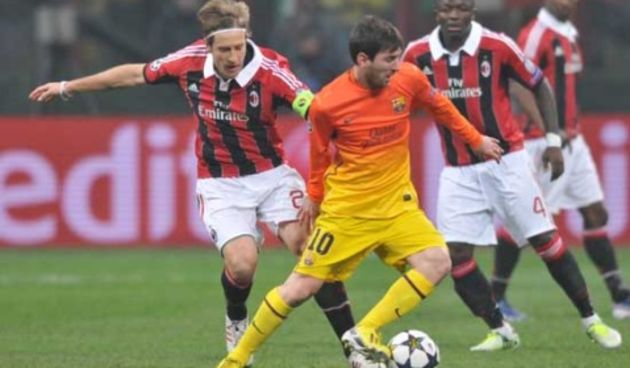 Massimo Ambrosini i Lionel Messi, foto: acmilan.com